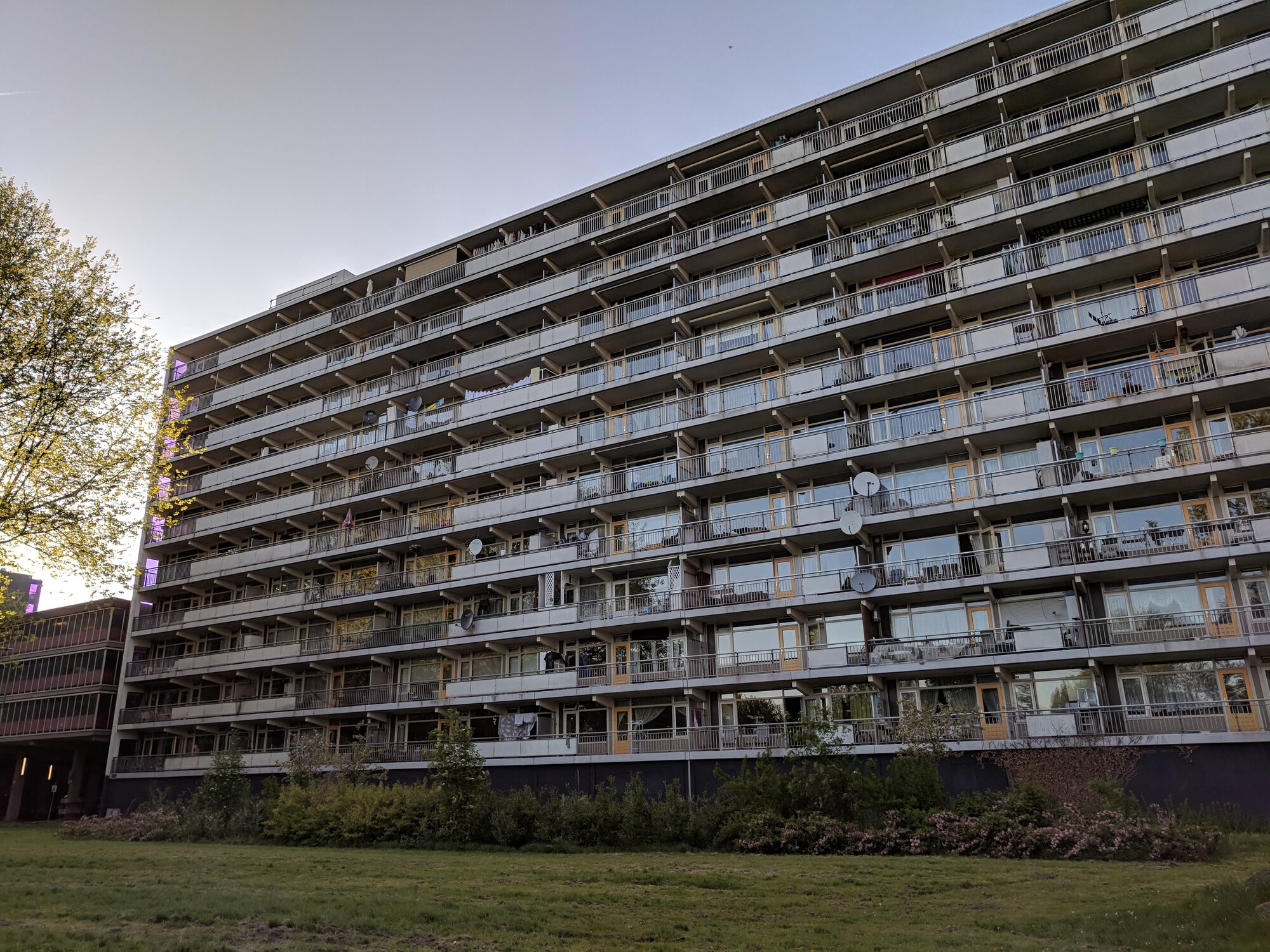 Residential building with balconys and people's personal stuff